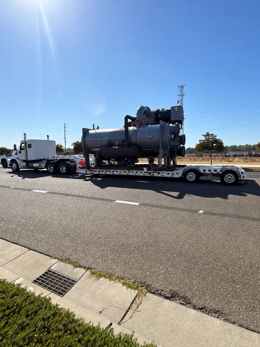 Chiller on a lowboy trailer outdoors